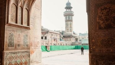 a person outside of a mosque